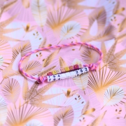 Różowa adresówka paracord Bueno DOG z imieniem DAENERYS i białymi koralikami z numerem
